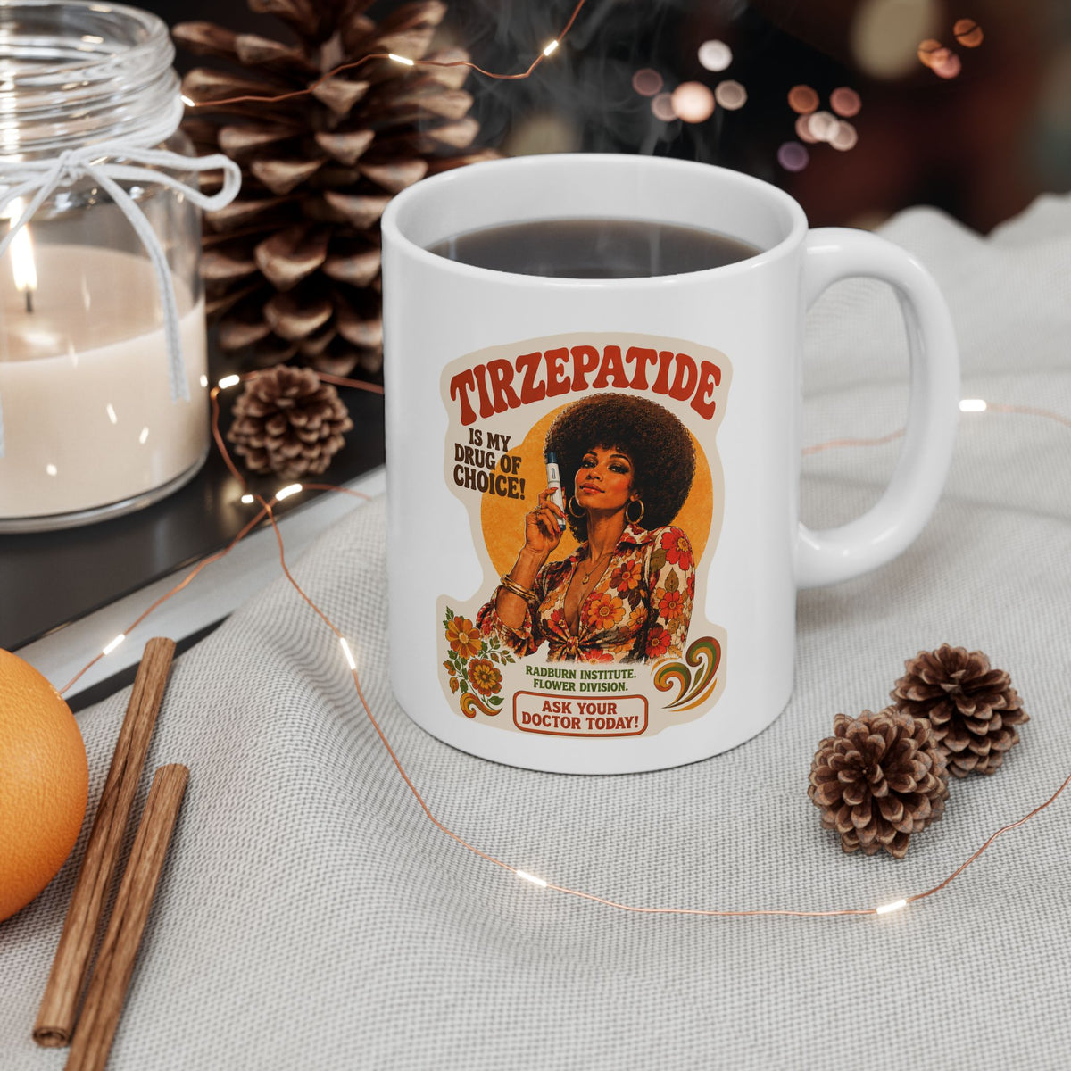 White Tirzepatide Mug — No Mustache filled with a dark drink beside pine cones, cinnamon sticks, and a candle | color:all