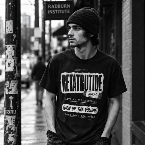 Black-and-white portrait of a man wearing a Retatrutide shirt on a city sidewalk | color:Black