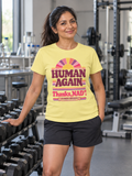 Woman wearing cornsilk Human Again NAD+ T-shirt in a laboratory gym | color:Cornsilk